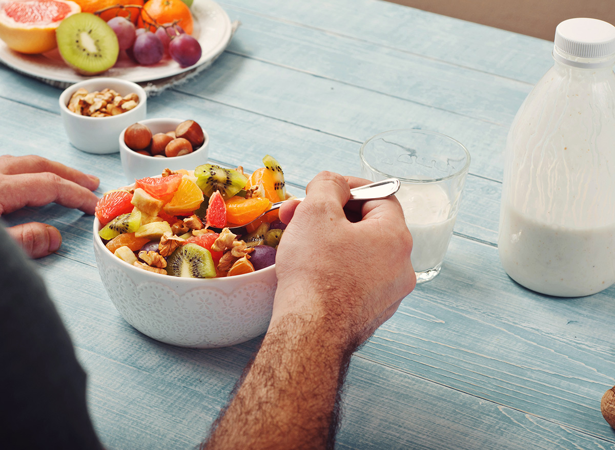 Man eating fruit platter