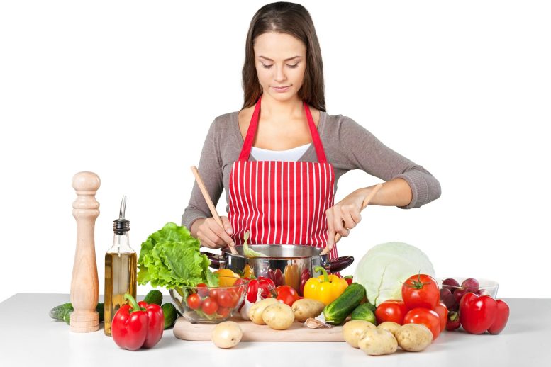 Woman Cooking Vegetables