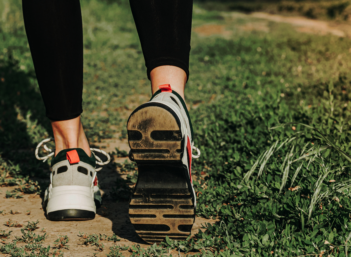 close-up woman walking sneakers