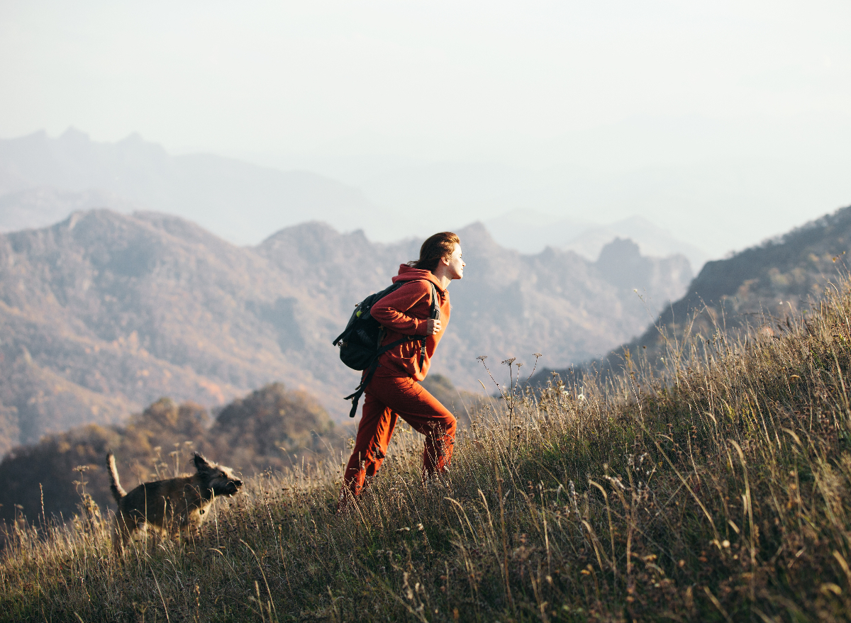 woman doing uphill walk, exercise to lose inches from waist