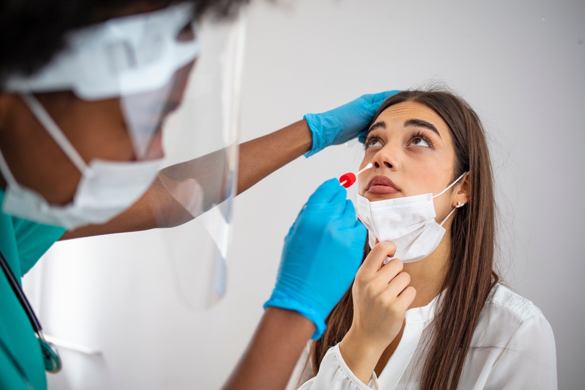 Woman taking the COVID test.