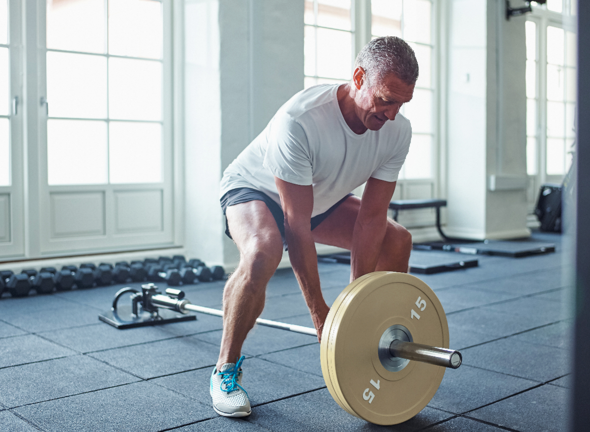 mature man barbell exercise to lose belly fat and slow down aging