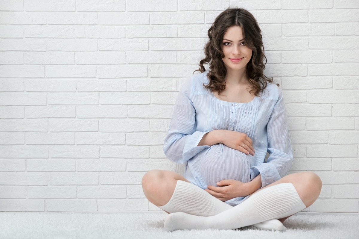 Portrait of the young pregnant woman