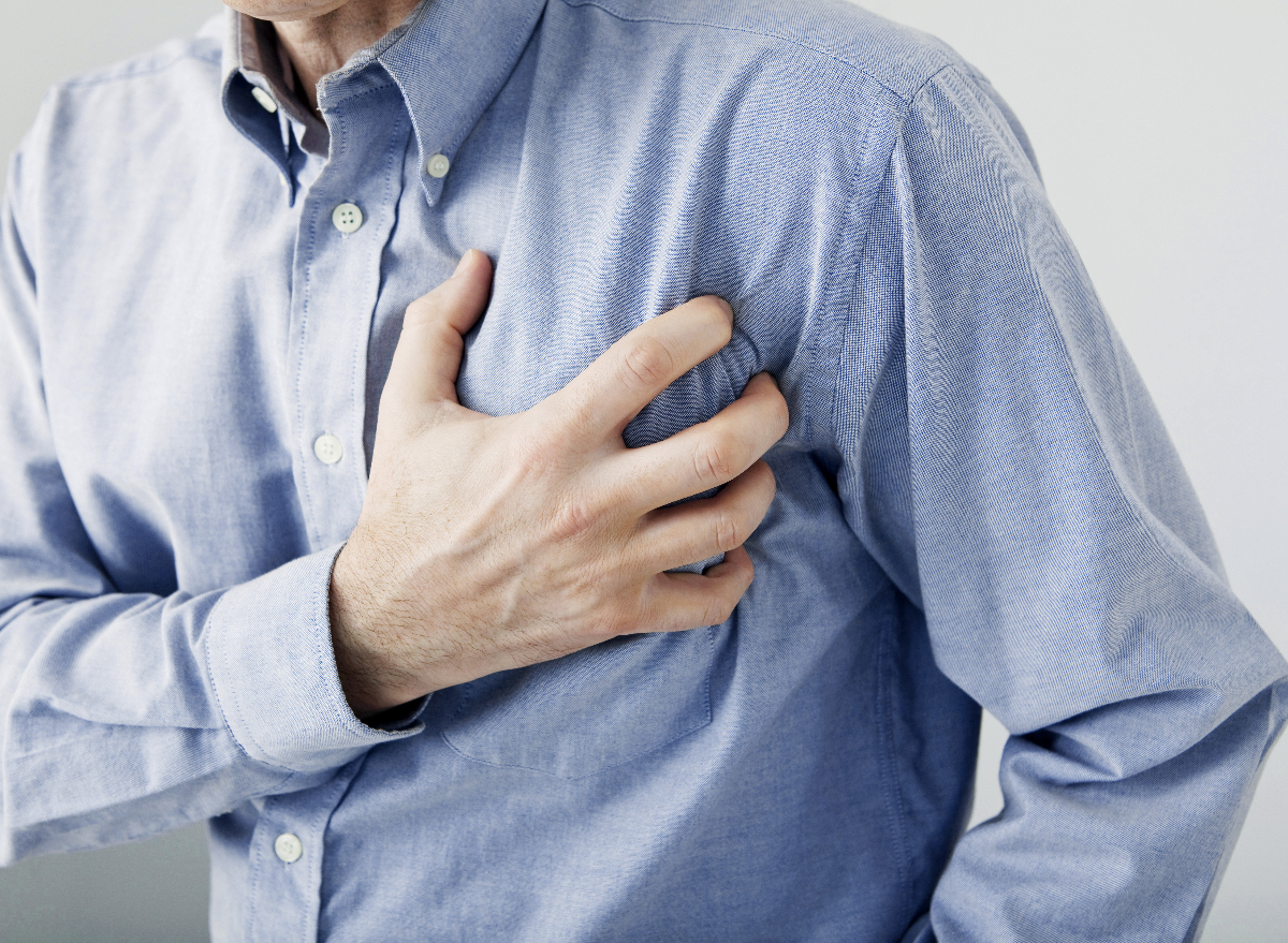 senior man experiencing chest pain, heart attack