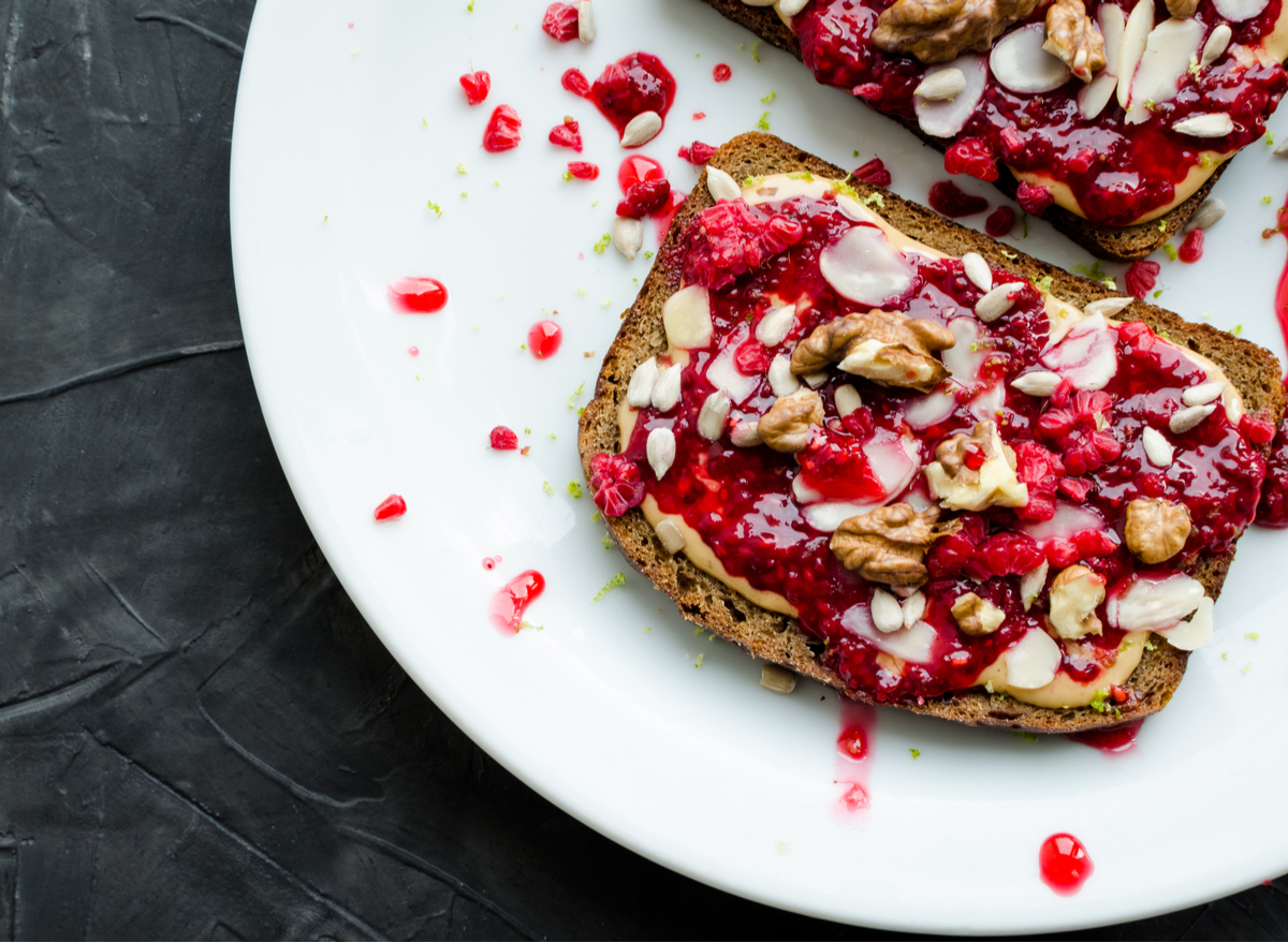 toast with peanut butter, chia and raspberry jam and walnuts