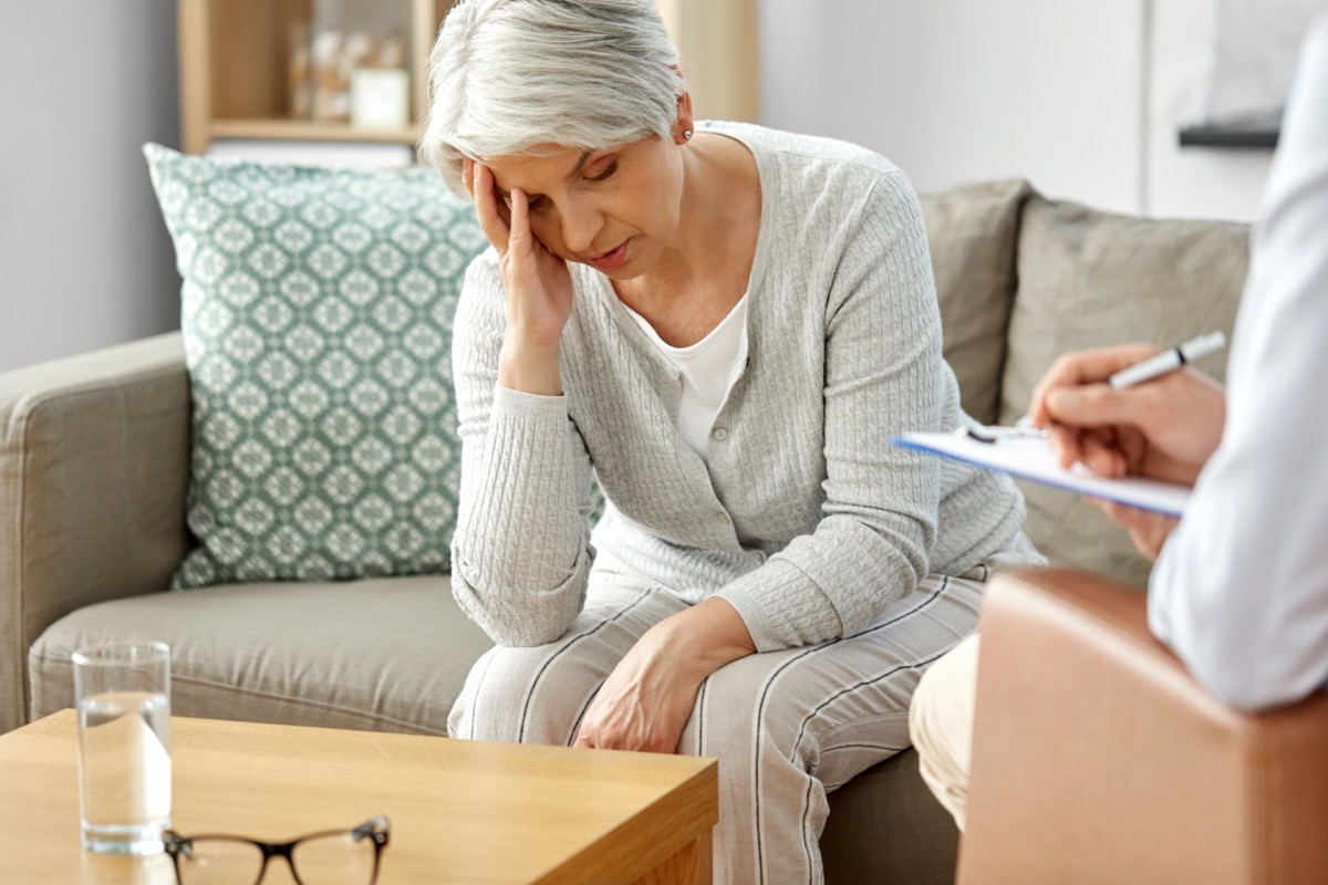 Unhappy elderly patient and psychologist