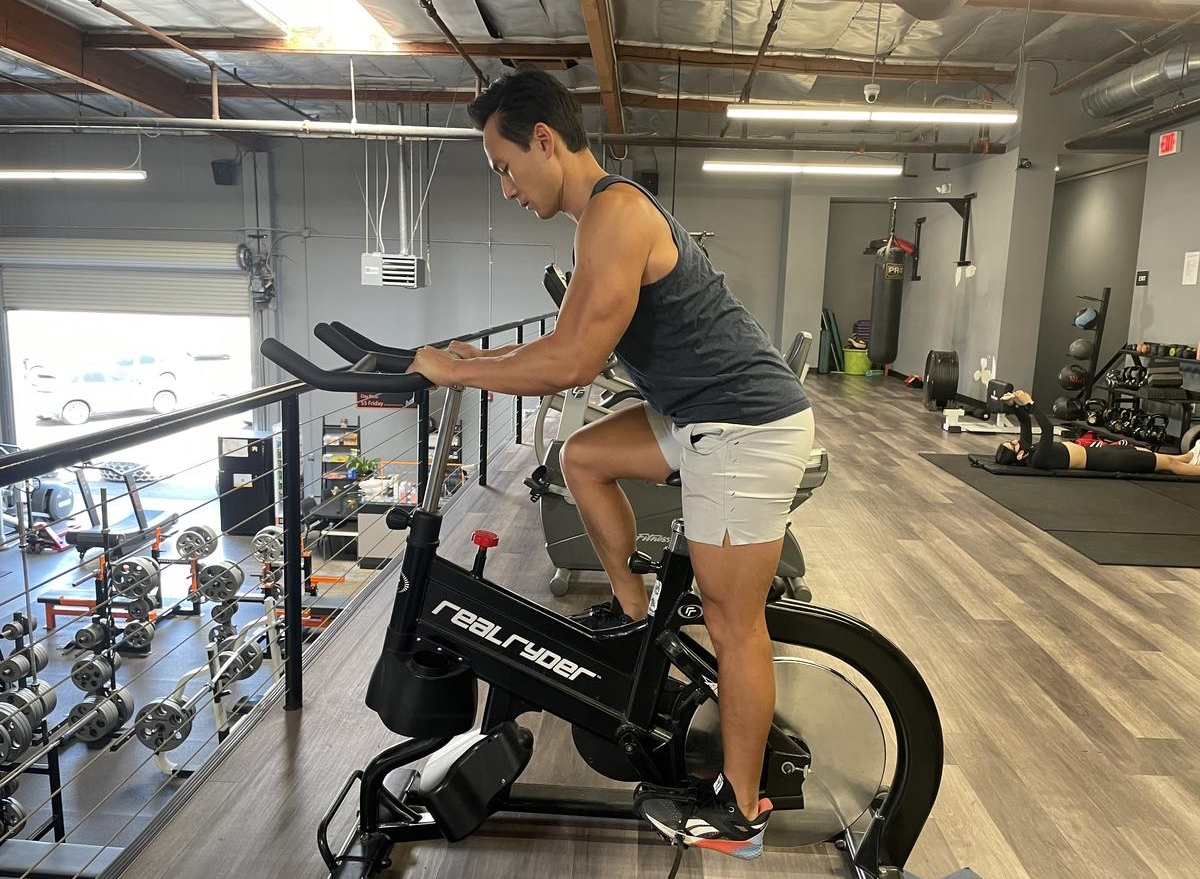 cycling coach in the gym