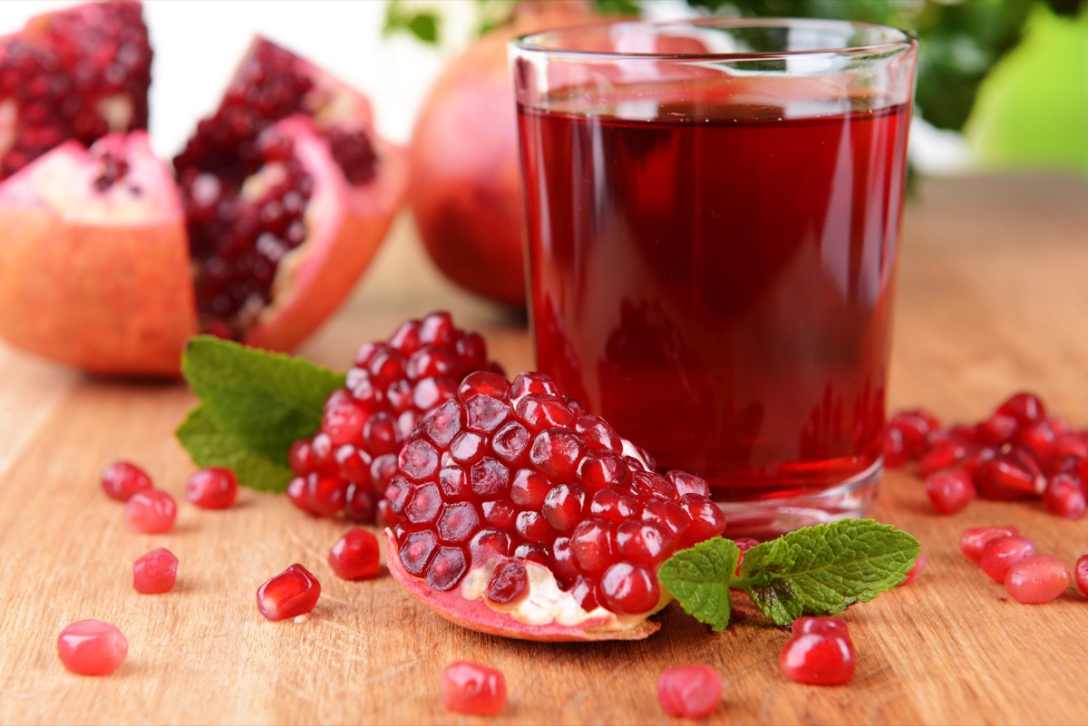 pomegranates with juice on the table