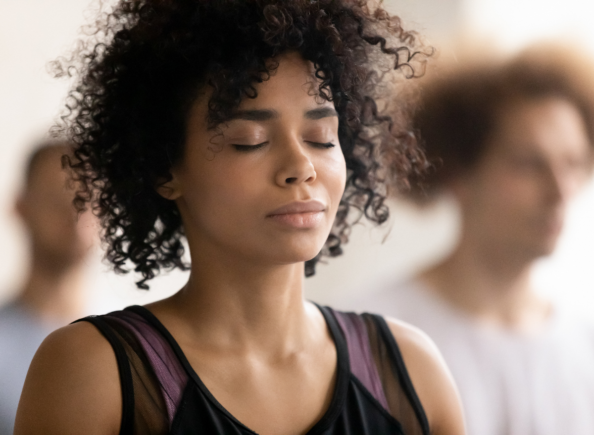 woman practicing 360 breathing during training