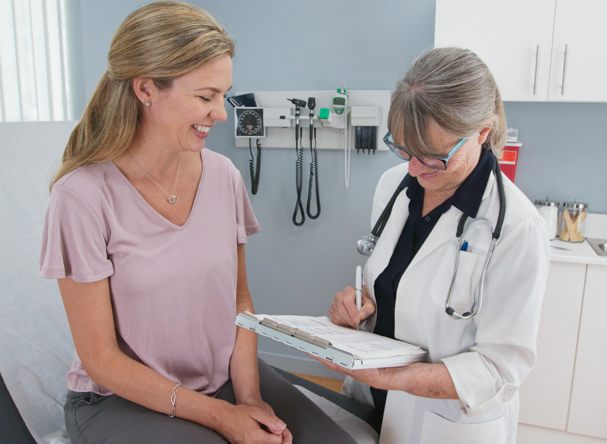 middle aged woman having a successful checkup, signs you are in good shape at 50