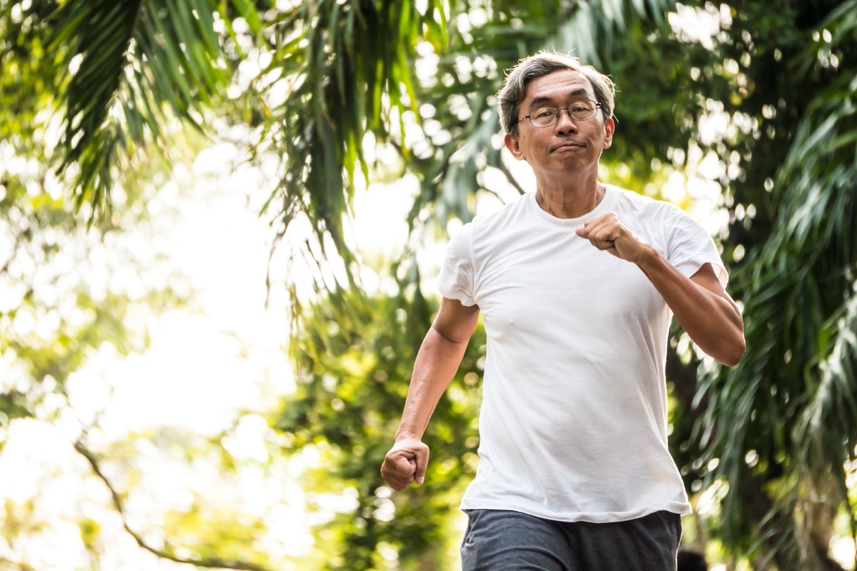 senior man walking outdoors