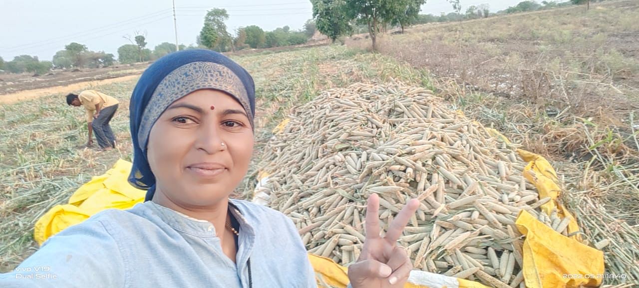 Savita in her field, enjoying the benefits of her hard work. 