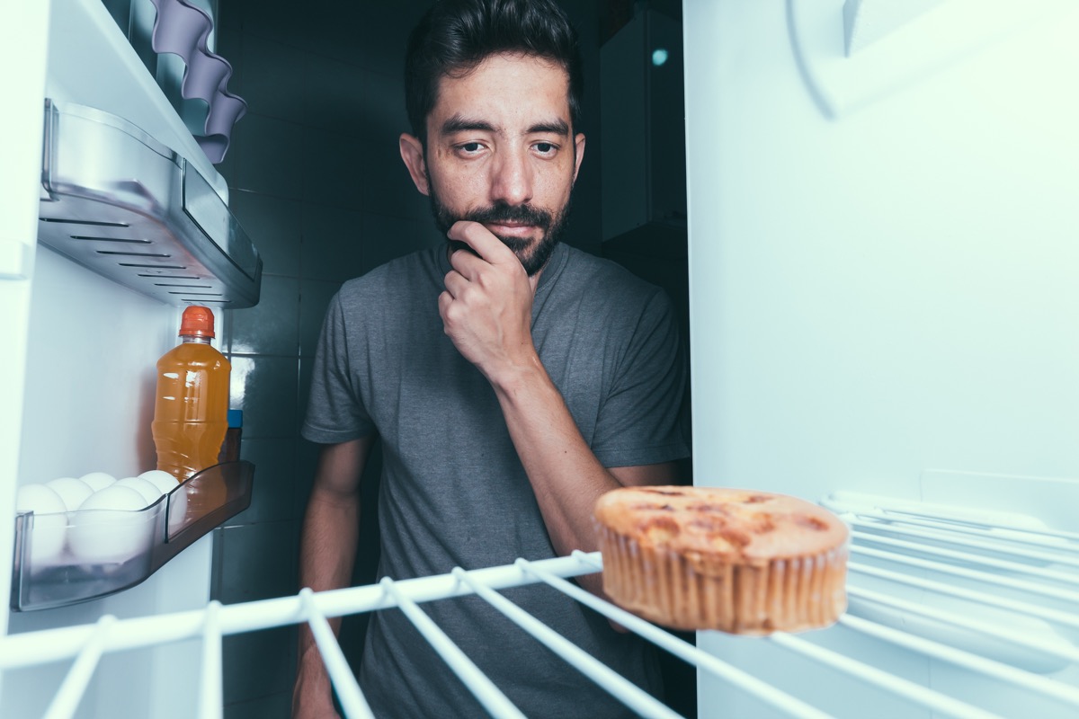 man eating late night snacks things you're doing that would horrify sleep doctors