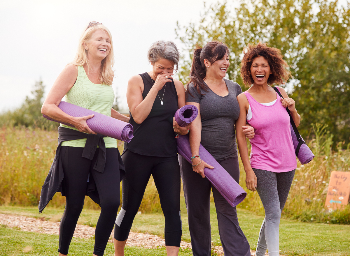 mature yoga friends demonstrating the sneaky habits to delay aging