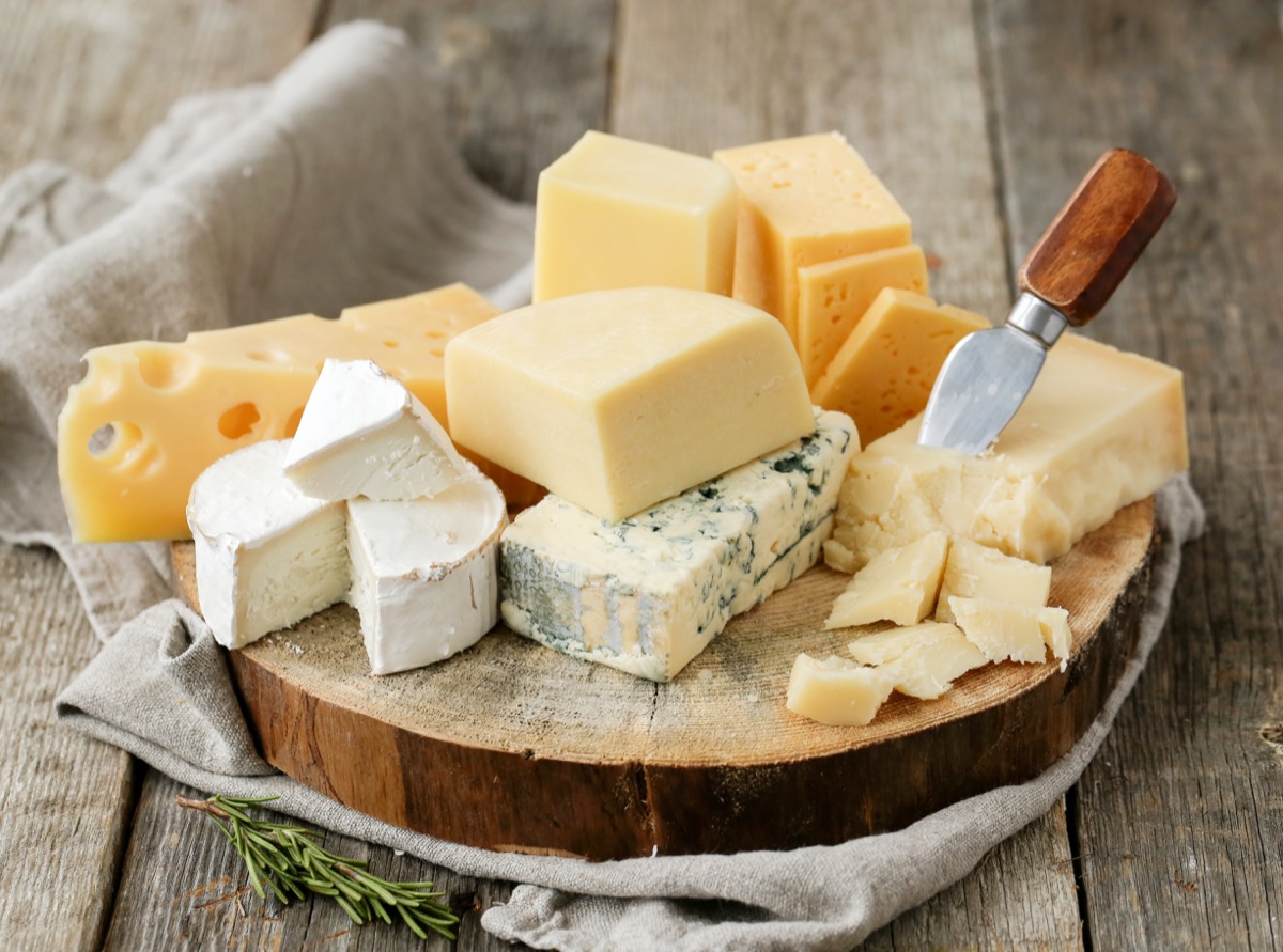 assorted cheeses on the table