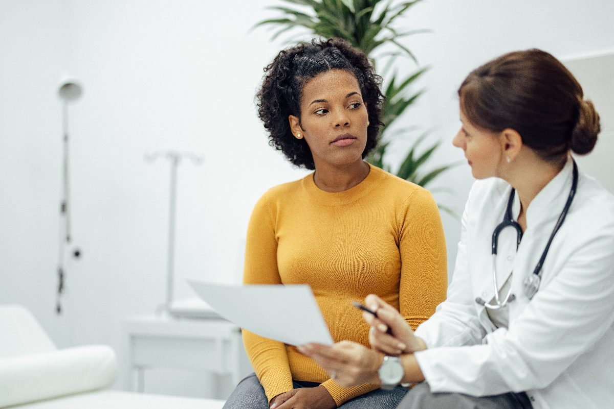 patient talking to doctor