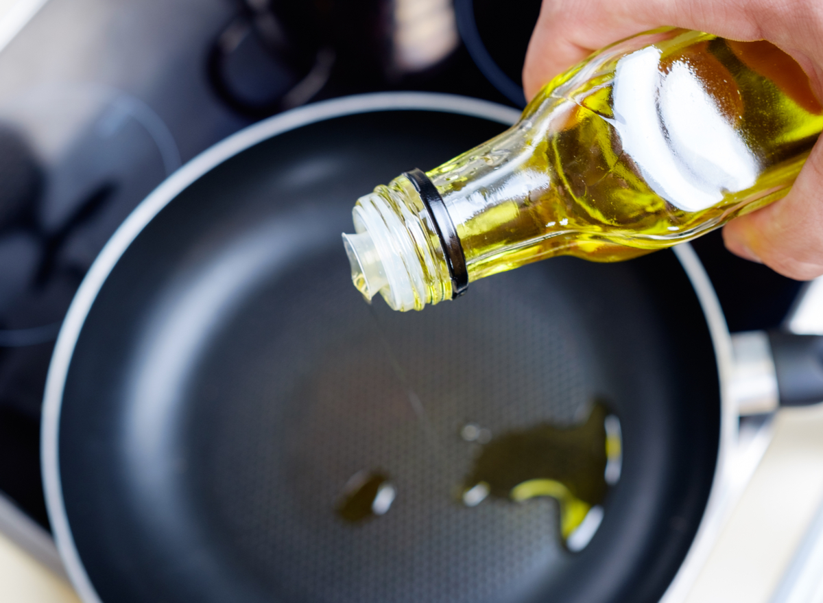 pour olive oil in a pan