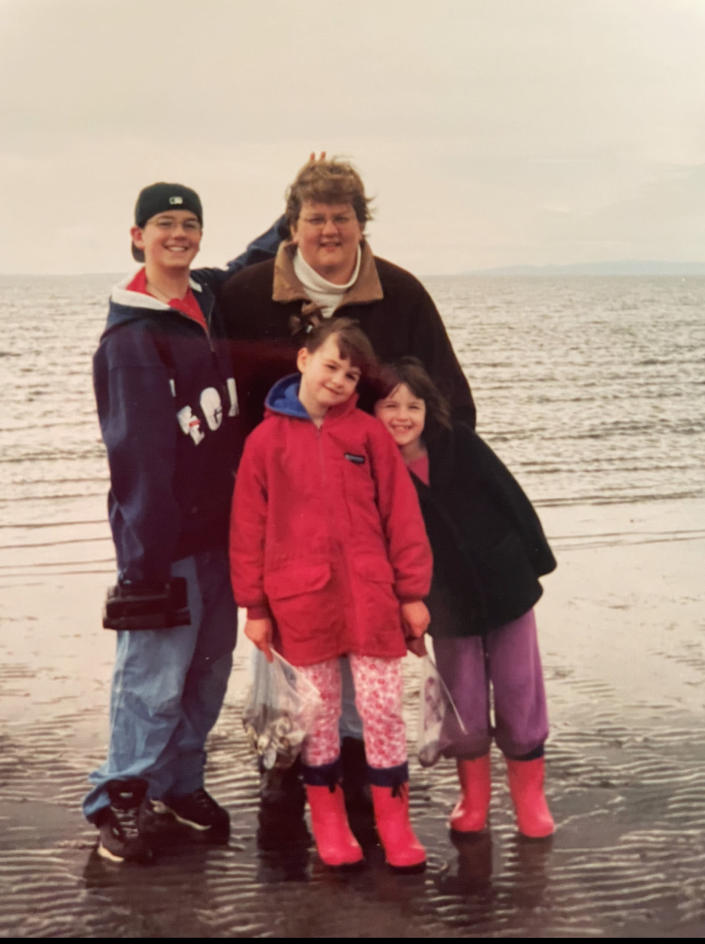 Lokken's weight placed his BMI in the severely obese category.  Here she shares a happy moment with her children, Devon, Kayla and Anna.  (Courtesy of Rhonda Lokken)