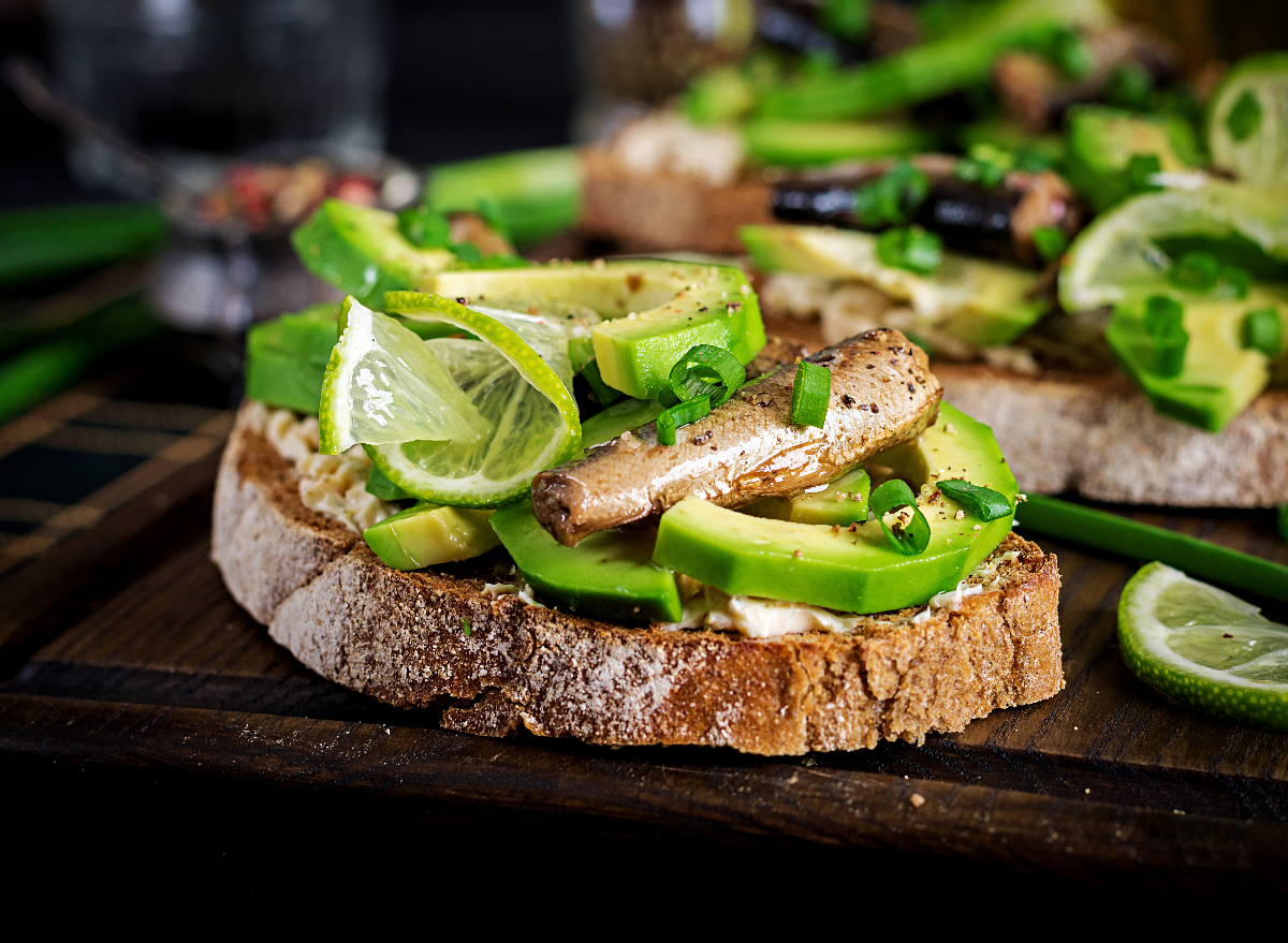 toast with cream cheese, avocado and sardines