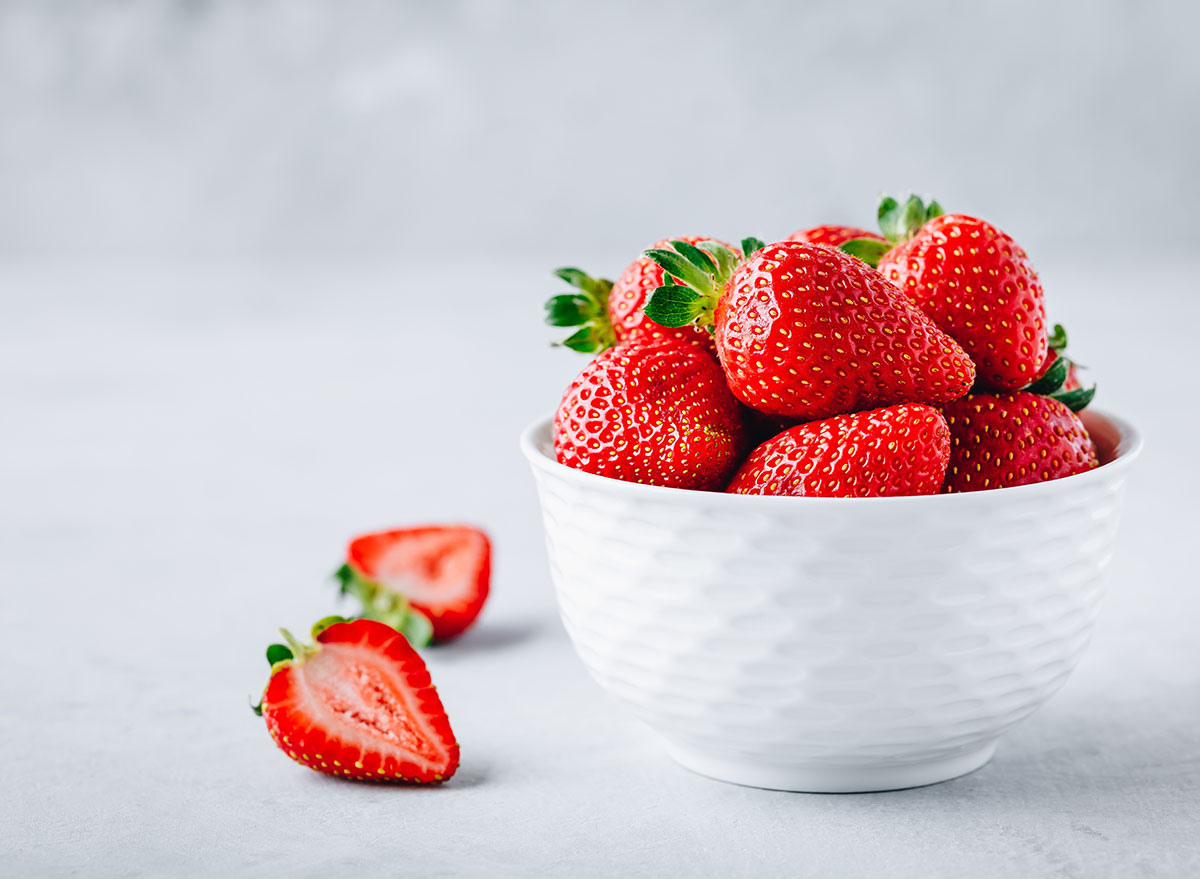 white bowl of strawberries