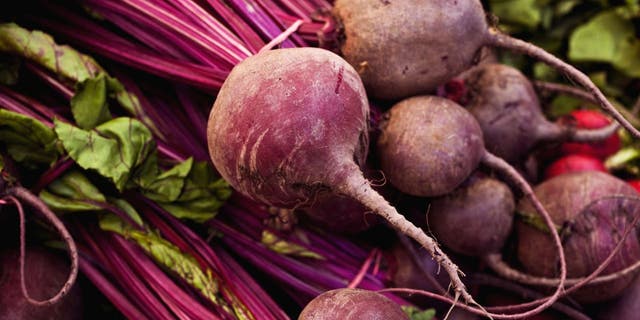 Beets, a source of natural chemicals called nitrates, are on display at a farmers market.  Studies suggest that a diet rich in nitrates may have a beneficial effect when it comes to improving cognitive brain function. 