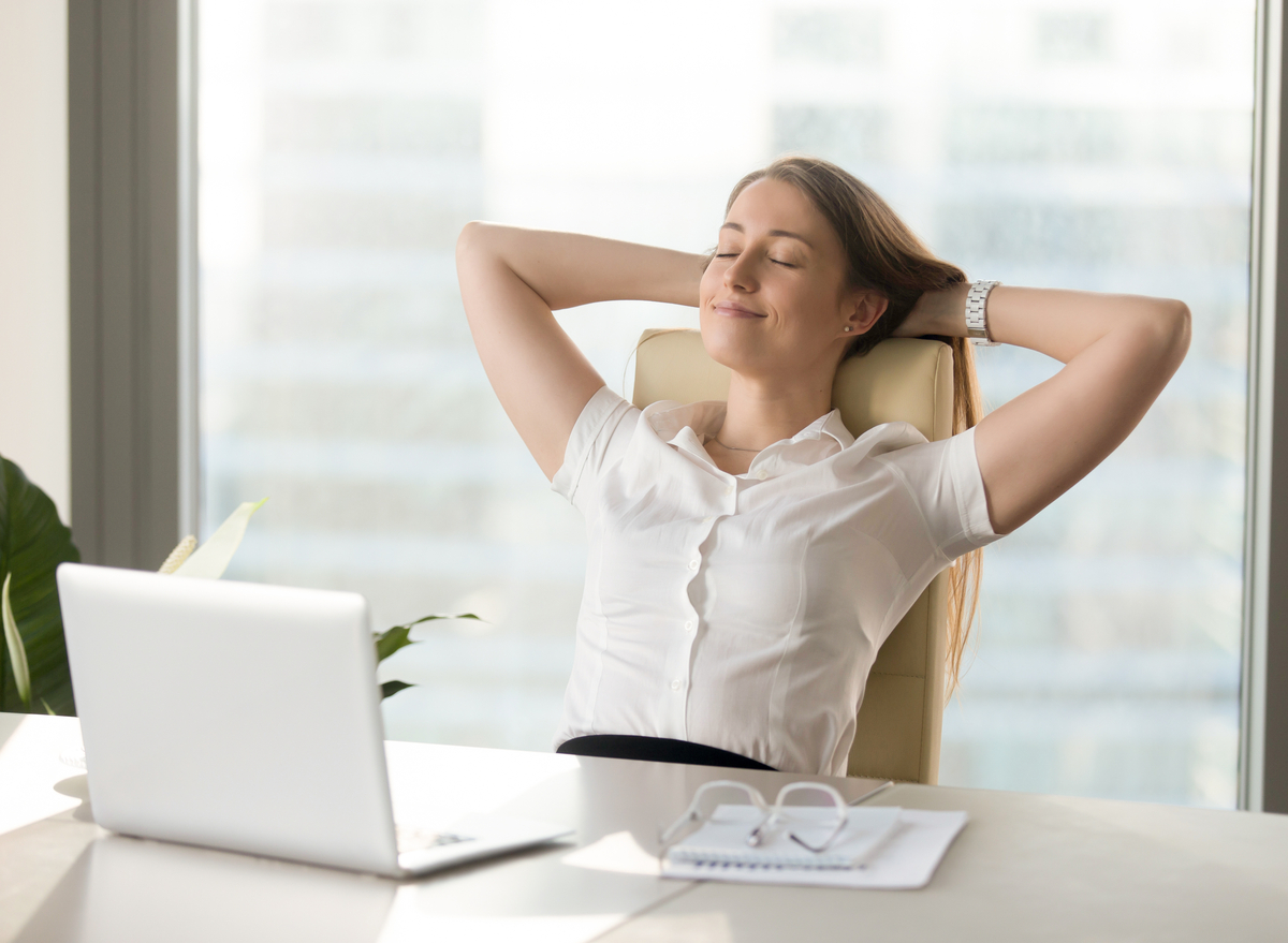 woman resting at desk