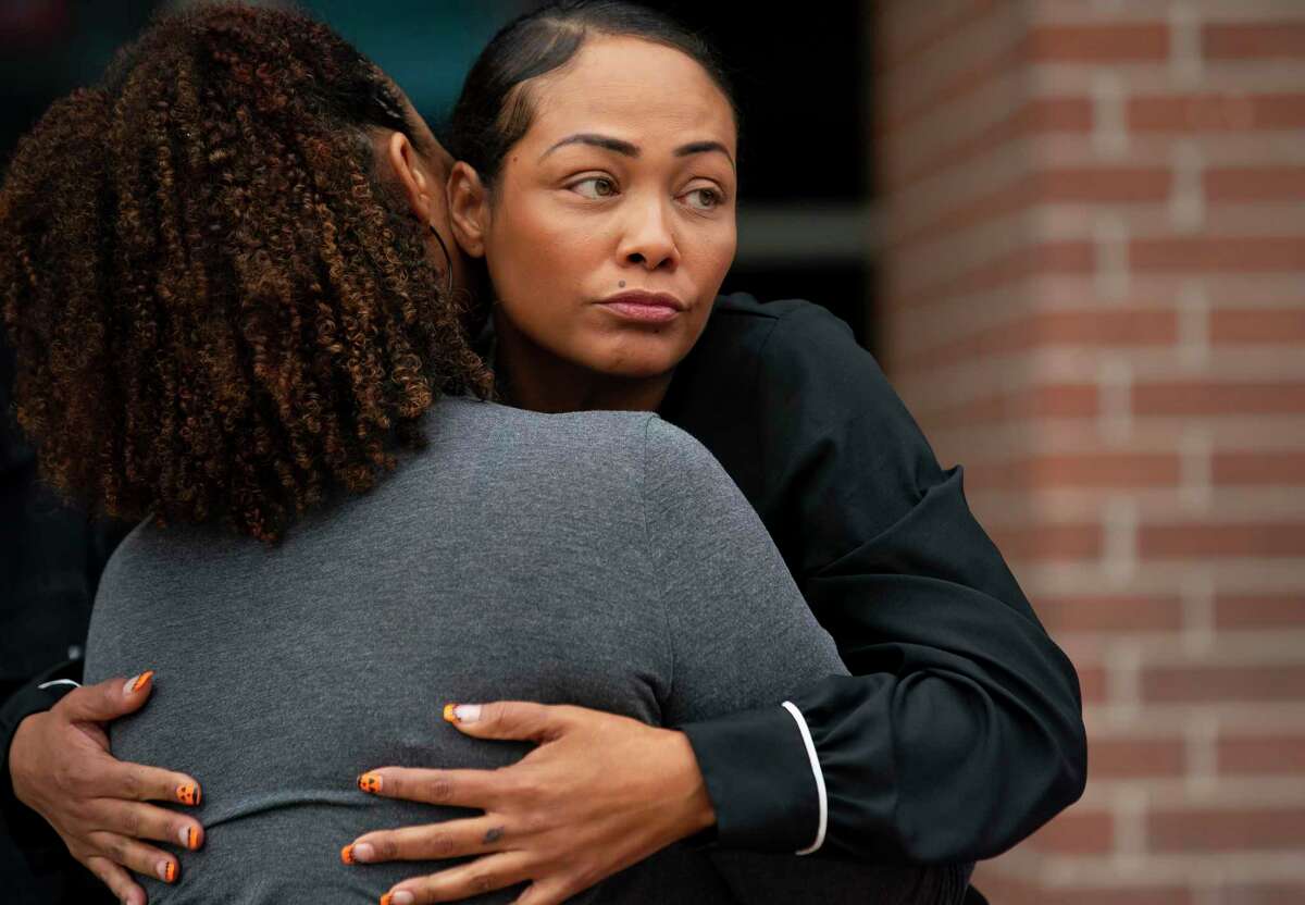 Dallas Garcia embraces a friend following a November press conference outside of the Harris County Jail. Garcia’s son, Fred Harris, had been arrested the month prior for walking down Westheimer Road in Montrose with a knife. While in jail, he was killed in jail by another inmate.