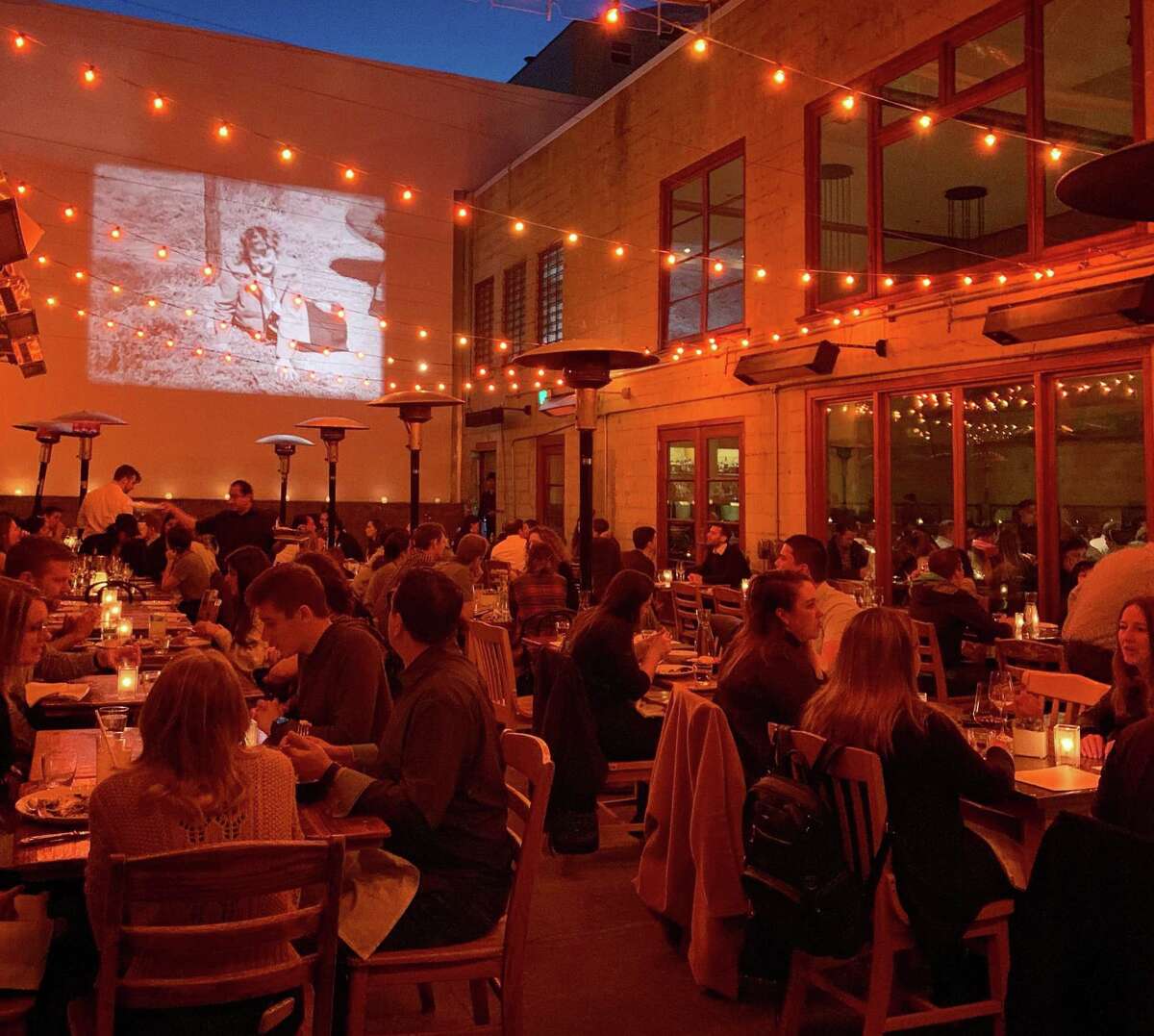 Foreign Cinema in the Mission District in San Francisco is known for its patio and movies projected on a white wall.