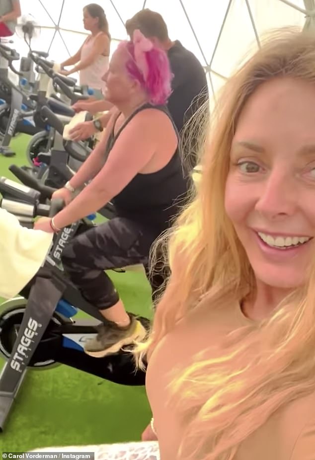 Stunning: The fitness fanatic donned a skintight beige t-shirt tucked into a pair of leopard-print leggings in the video compilation