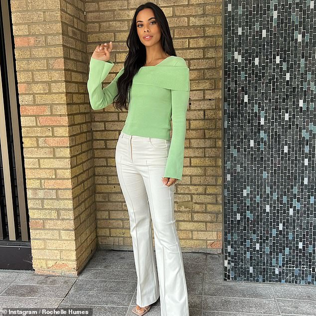 Glamour: Before the show, Rochelle took to Instagram to show off her latest look, teaming the green jumper with white Reiss flares and PrettyLittleThing heels.